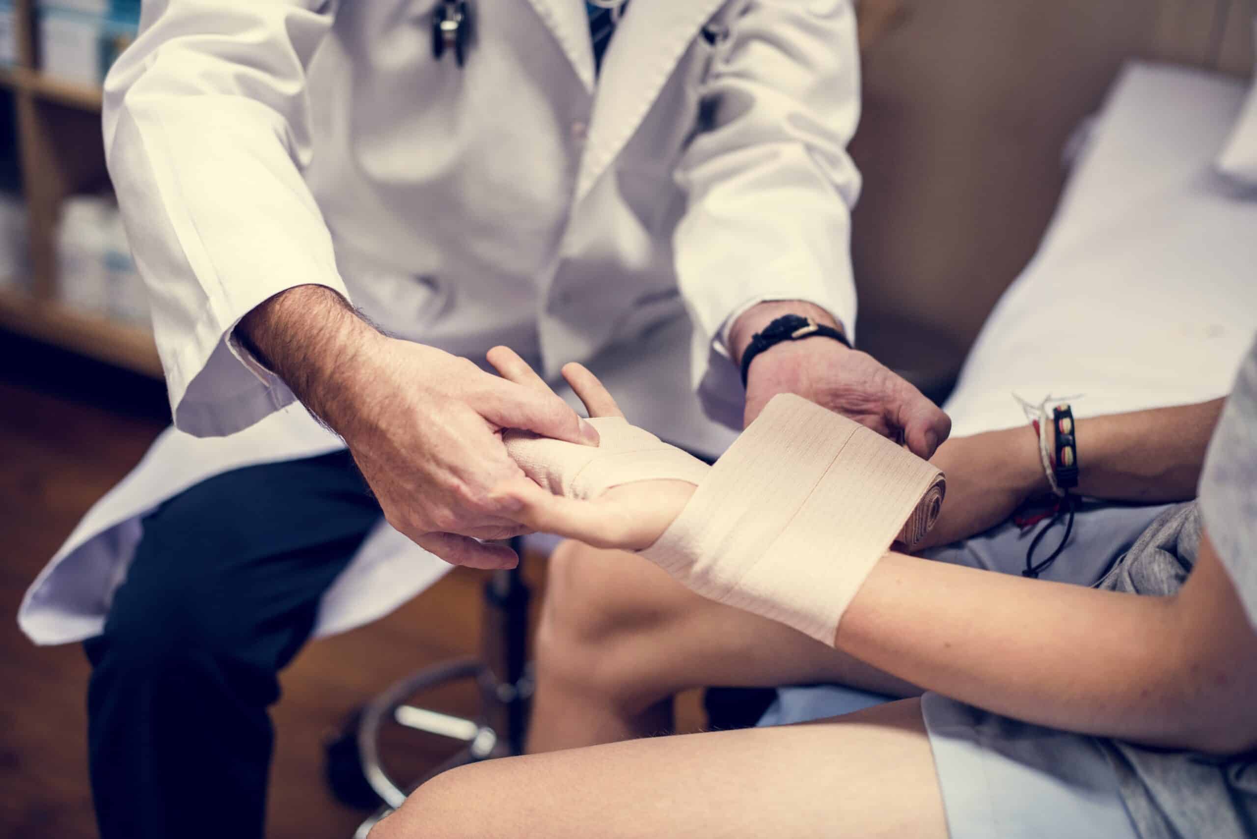 Doctor assisting a patient